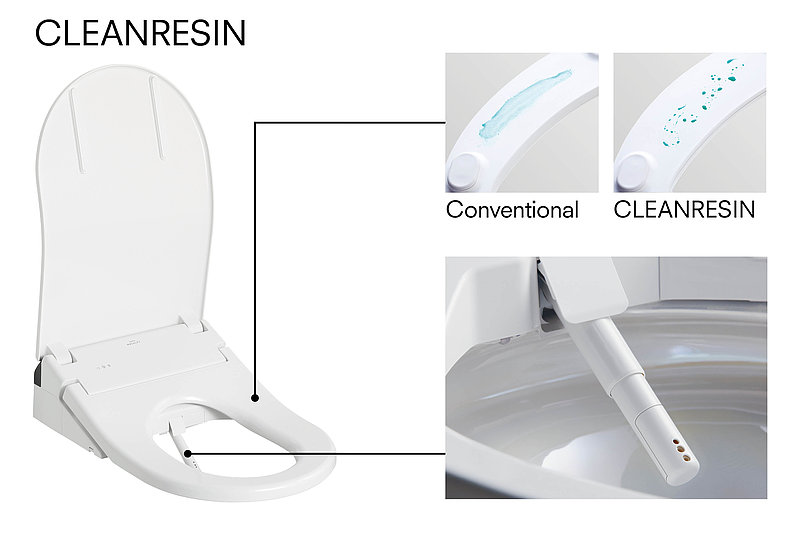 The image shows a graphic that highlights the properties of "CLEANRESIN" compared to conventional materials for toilet seats. There are three partial images: The first shows a toilet seat with the word "CLEANRESIN", the second compares two nozzles, one labeled "Conventional" and the other "CLEANRESIN", and the third shows water droplets rolling off the CLEANRESIN nozzle.